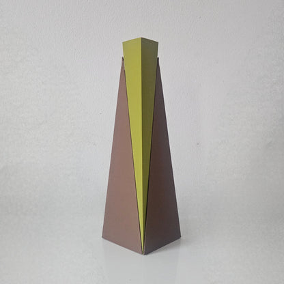 Tall, thin vase with a gradient color from green to brown on a light gray background